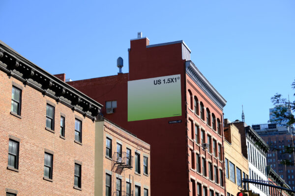 Billboard high on a red brick building in Manhattan.